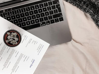 Resume sitting on a laptop